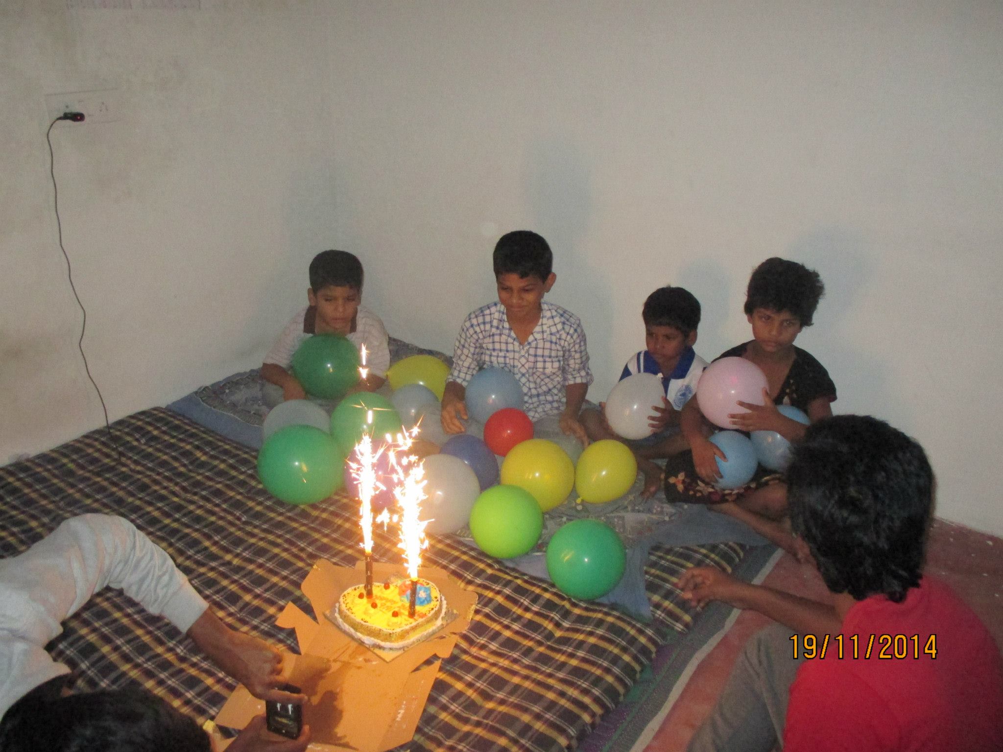 Children smiling, representing social impact.